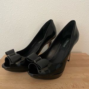 White House Black Market black patent leather platform heels with bows